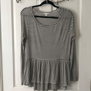 Black and white peplum long sleeved top